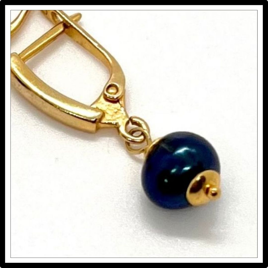 eleganckie kolczyki z czarnymi perłami