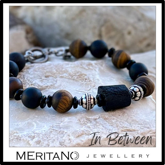 Męska bransoletka z czarnym turmalinem i tygrysim okiem na kamieniu Męska bransoletka z czarnym turmalinem i tygrysim okiem na kamieniu