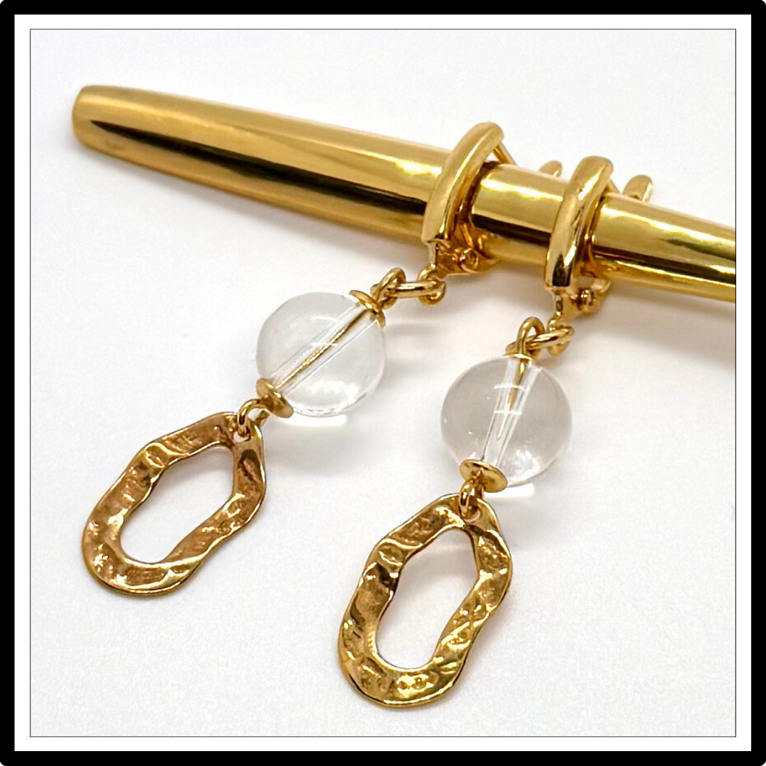 Złote kolczyki kryształ górski. Długie kolczyki z kamieniami
