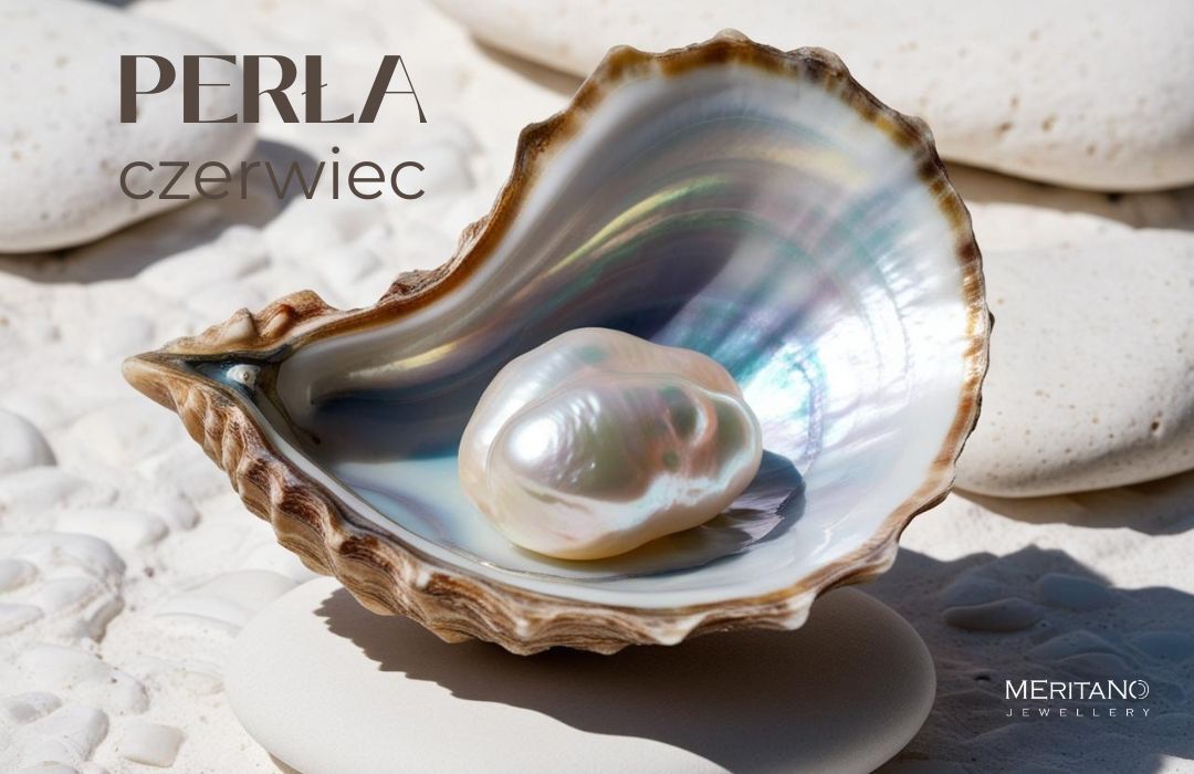 Perła w muszli na piasku