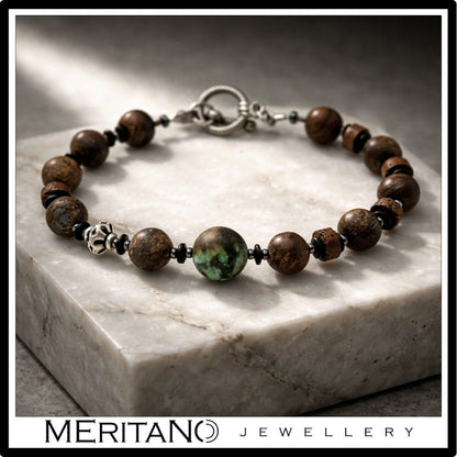 Bransoletka męska z bronzytem i turkusem, srebro oksydowane - widok na marmurze