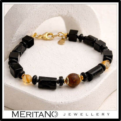 Bransoletka z turmalinem, onyksem, agatem i cytrynem na białym gipsie