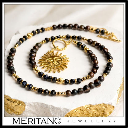 naszyjnik z perłami, szafirami i złotym słońcem , czarno brązowe perły naturalne