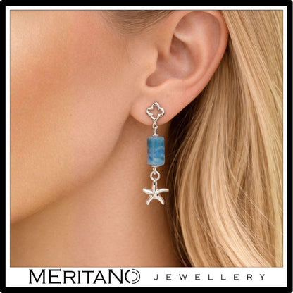 srebrne kolczyki z apatytem na uchu